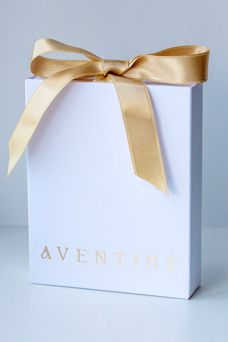 White and gold elegant jewelry gift packaging box with bow