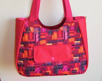 sac à main rose fuchsia pour femme porté épaule zippé