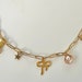 see more listings in the All Gold Charm Necklaces section
