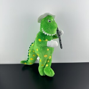The Wiggles Dorothy Green Dinosaur Holding Flute Plush Stuffed