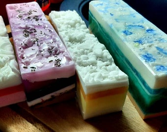 Soaps hand-poured, in different designs, great colors and scents, vegan and skin-care, each individually wrapped soaps