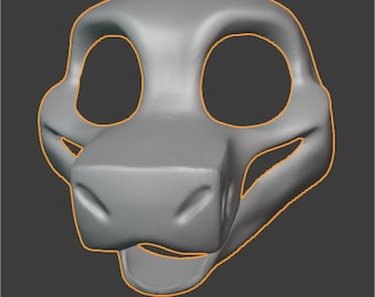 May include: A gray 3D model of an animal head, possibly a lizard or a dragon, with large eyes and a wide mouth. The model is designed for use in 3D printing or other digital art projects.