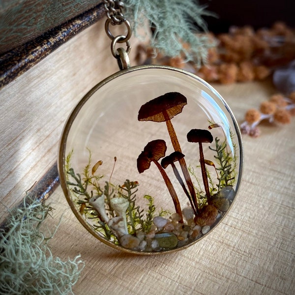 Real mushroom terrarium pendant. Botanical fairy forest necklace made from resin, moss, lichen, leaves, pebbles & fungi.