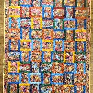 Price reduced: Bright, Colorful Multi-fabic Throw or Lap Quilt