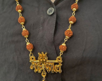 Golden Caps Rudraksha Mala With Shiv Ji Mahakal Locket Rudraksha