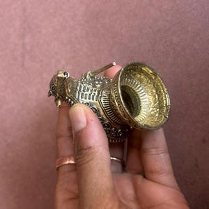 Shivling Collectible Idol Rare Brass Shivling Antique Shivling Statue Vintage Religious Shivling Hindu Devotional Collectible Brass Shiva Lingam Collection Mythological Shivling Idol Unique Shivling Artifact Indian Heritage Shivling Sacred Brass Shivling