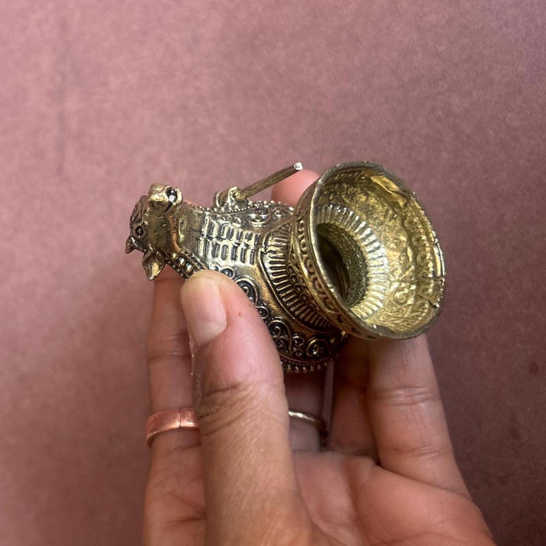 Shivling Collectible Idol Rare Brass Shivling Antique Shivling Statue Vintage Religious Shivling Hindu Devotional Collectible Brass Shiva Lingam Collection Mythological Shivling Idol Unique Shivling Artifact Indian Heritage Shivling Sacred Brass Shivling