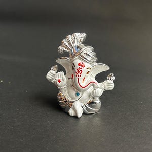 Ganesha statue show piece.Little  Ganesh Hindu God Lord Antique Small Ganesha Idol Sculpture Statue Figurine pocket Ganesha. Lucky Ganesha.