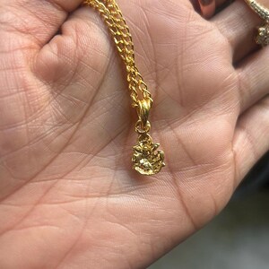 Handmade deity necklace
Devotional charm jewelry
Religious gift for kids
Mini Ganpati idol necklace
Indian mythology jewelry
Cartoon Ganesha pendant
Colorful Ganpati charm
Yoga and meditation pendant
Ganesh blessings jewelry
Cute deity locket