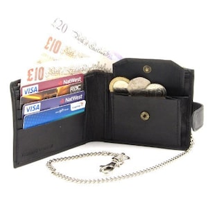 May include: A black leather wallet with a chain attached. The wallet is open and has several credit cards and cash inside. There are also several coins in the coin pocket.