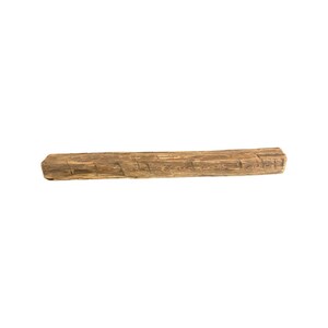 May include: A rustic wooden mantel shelf with a natural brown finish and a rough, textured surface.