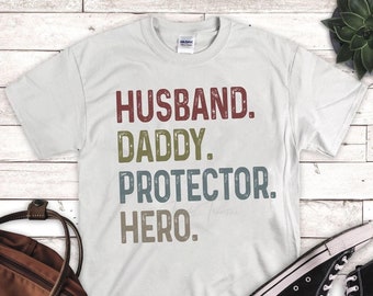 Husband. Daddy. Protector. Hero. T-Shirt - Unisex / Men's / Plus Size Shirt - Great for Father's Day!