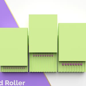 Peut inclure: Un rouleau à billes vert composé de trois sections. Chaque section est dotée d'une série de petites billes violettes qui courent le long du bas.