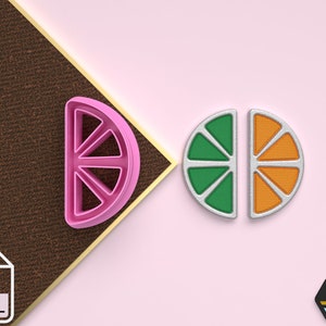 May include: Two 3D printed cookie cutters in the shape of a half orange slice. One cutter is pink and the other is silver with green and orange details.