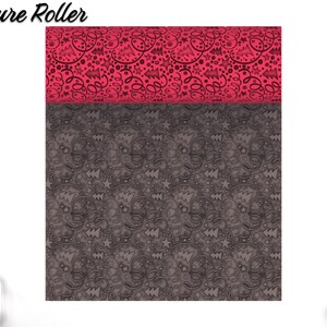 May include: A black and white textured roller with a repeating pattern of stylized Christmas trees, stars, and swirls. The roller is shown with a red and black patterned top.