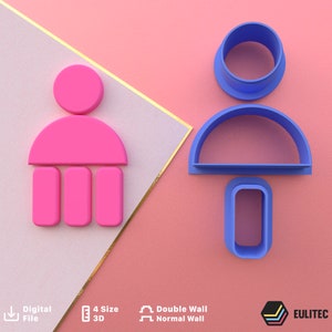 Puede incluir: Dos cortadores de galletas impresos en 3D, uno rosa y otro azul, con forma de persona. El cortador rosa tiene una cabeza redonda, un cuerpo semicircular y tres piernas rectangulares. El cortador azul tiene una cabeza redonda, un cuerpo semicircular y una pierna rectangular.