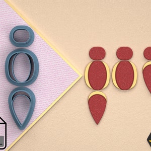 Puede incluir: Un conjunto de tres cortadores de galletas en forma de lágrima, con la parte superior redondeada y la inferior puntiaguda. Los cortadores son de plástico azul y están dispuestos en una pila vertical. Los cortadores están sobre un fondo rosa y blanco. La imagen también muestra un conjunto de tres cortadores de galletas en forma de lágrima, con la parte superior redondeada y la inferior puntiaguda. Los cortadores son de plástico rojo y están dispuestos en una fila horizontal. Los cortadores están sobre un fondo beige.