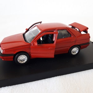 Red Alfa Romeo, 1/43 scale with plastic box, Collector cars