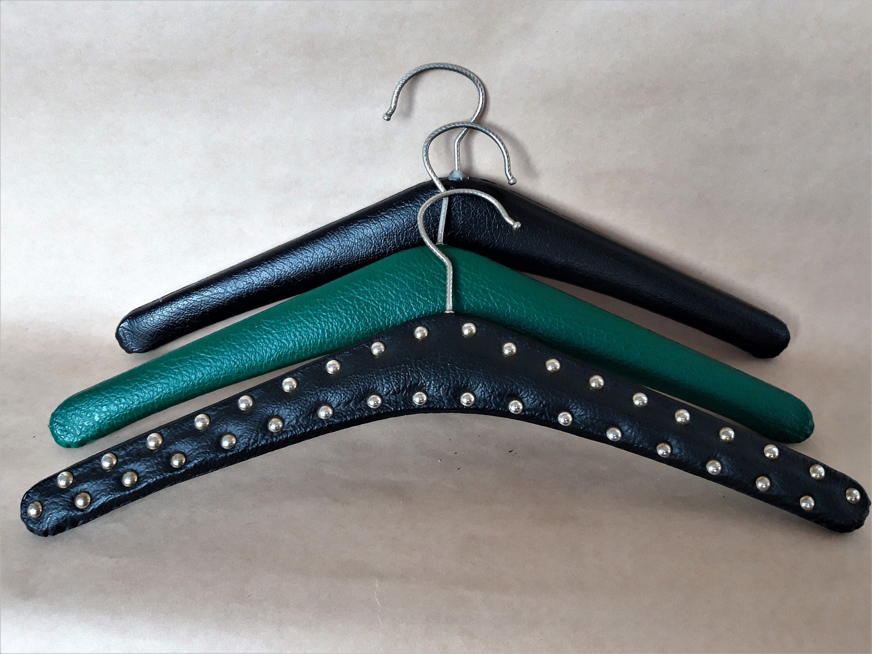 2 vintage studded leatherette hanger. 1 Mac intosh pattern vinyl hanger.  1960. Sixties wardrobe. Mid Century hanger.