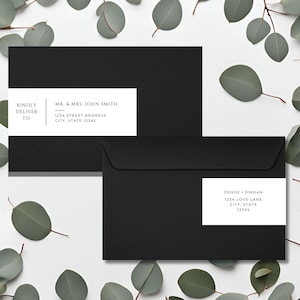 May include: Two black envelopes with white address labels. The top label reads "KINDLY DELIVER TO: MR. & MRS. JOHN SMITH 1234 STREET ADDRESS CITY, STATE 12345". The bottom label reads "DENISE JORDAN 1234 LOVE LANE CITY, STATE 12345".
