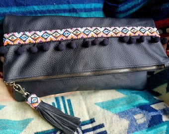 Recycled Leather clutch bag with trim