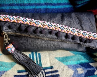 Recycled Leather clutch bag with trim