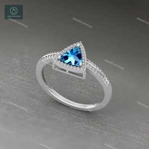 Swiss Blue Topaz Ring: Sterling Silver Trillion Cut, December Birthstone