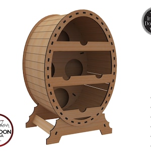 May include: A wooden wine rack shaped like a barrel, featuring three shelves with circular bottle openings. The design includes the text "Cartoon ART-SA -2022-" and "Instan Download". The rack is made of wood.