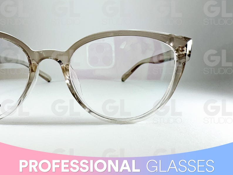 May include: Clear-framed eyeglasses with a cat-eye shape. The glasses have a light brown tint and thin temples. The text "PROFESSIONAL GLASSES" is at the bottom of the image.