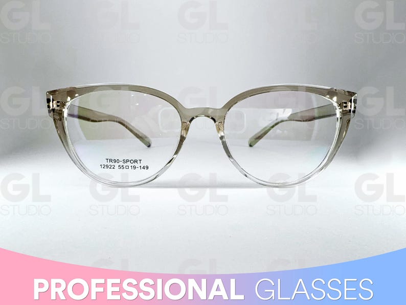 May include: Clear-framed spectacles with a cat-eye design. The glasses have a transparent frame and lenses. The text "TR90-SPORT 12922 55019-149" is printed on the lower left lens. The words "PROFESSIONAL GLASSES" are at the bottom.
