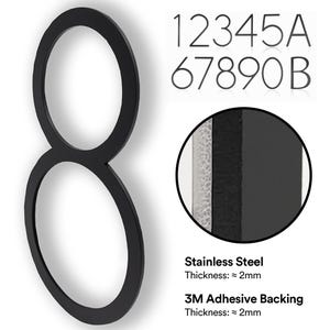 Könnte beinhalten: Schwarze Hausnummer acht aus Metall mit 3M-Klebeband. Die Nummer ist etwa 2 mm dick und aus Edelstahl.