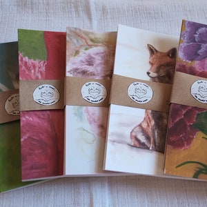 Postales ilustradas en formato A6: zorro, koala, flamenco, abeja, margarita y clavel. Individuales o en paquete (diseño combinado o seleccionado)