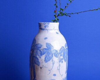 White and blue handmade ceramic vase