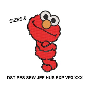 May include: An embroidery design featuring a red character with a round orange nose and large white eyes with black pupils. The text SIZES:6 appears in the upper left, and the text DST PES SEW JEF HUS EXP VP3 XXX is at the bottom.