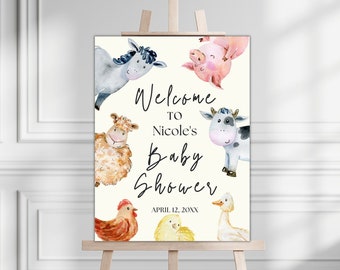 May include: Welcome to Nicole's Baby Shower sign with a white background and watercolor illustrations of farm animals including a pig, cow, sheep, donkey, chicken, duck, and chick. The text reads "Welcome to Nicole's Baby Shower April 12, 20XX".