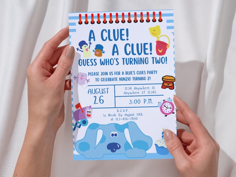 May include: Blue's Clues birthday party invitation with a blue dog character, a red bucket, a yellow sun, and a clock. The invitation says "A Clue! A Clue! Guess Who's Turning Two!" and includes the date, time, and address of the party.