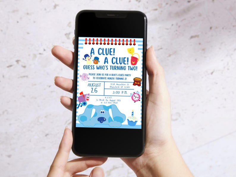 May include: A blue and white invitation for a Blue's Clues birthday party. The invitation features a cartoon image of Blue, the dog from the show, and the text "A Clue! A Clue! Guess Who's Turning Two!"  The invitation also includes the date and time of the party.