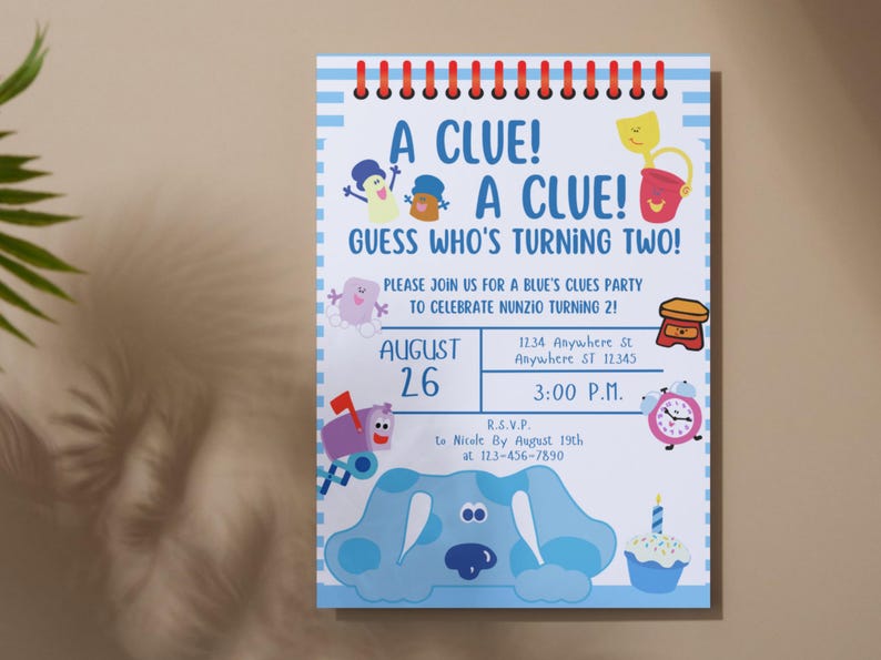 May include: A blue and white invitation card with a cartoon character from the show Blue's Clues. The card says "A Clue! A Clue! Guess Who's Turning Two!" and includes details for a birthday party.
