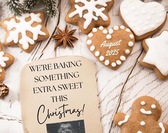 May include: A brown paper note with the text "We're baking something extra sweet this Christmas!" and a black and white ultrasound image. The note is surrounded by gingerbread cookies decorated with white icing in the shapes of stars, snowflakes, and hearts. One heart-shaped cookie has the text "August 2025" on it.