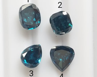 May include: Four loose blue gemstones, two square and two heart-shaped, on a white background. The gemstones are numbered 1 through 4.
