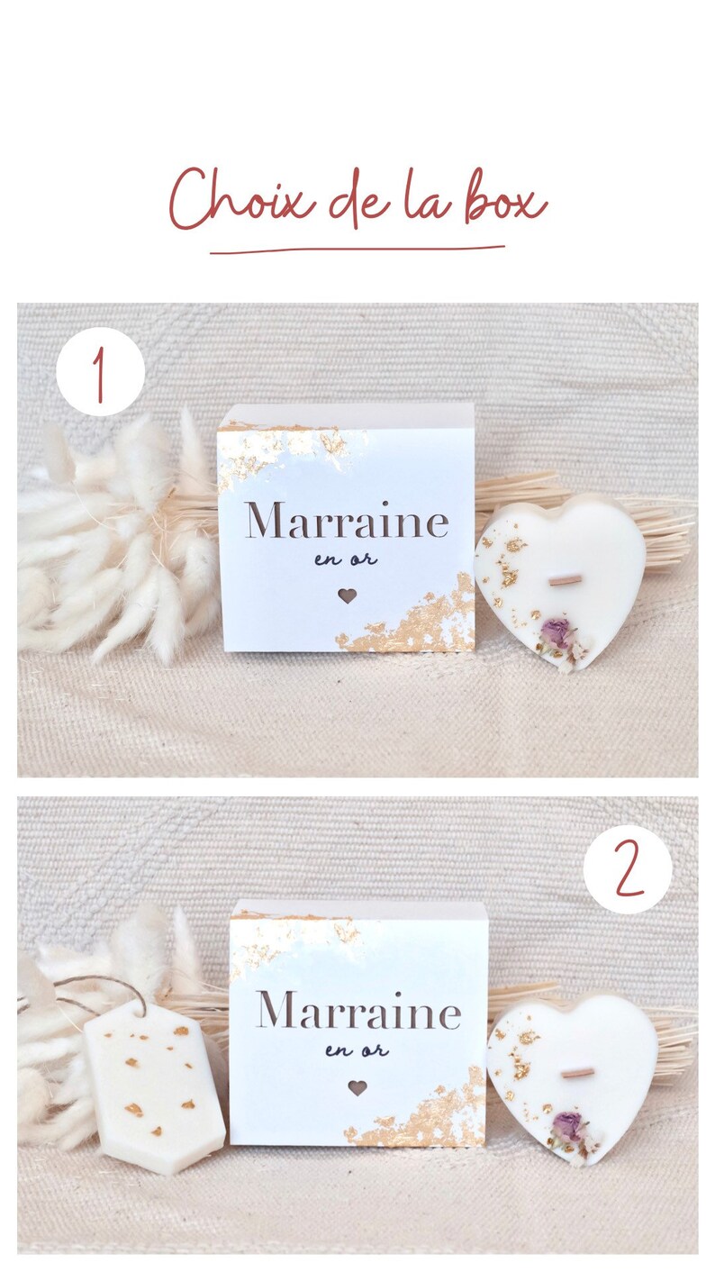 Op de afbeelding: De afbeelding toont twee cadeau-opties. Elke optie bevat een witte doos met gouden accenten en de tekst "Marrine en or", en een hartvormige kaars. E&eacute;n optie heeft een rechthoekige kaars.