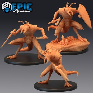 May include: Three 3D printed miniatures of humanoid figures with insect-like features. The figures are posed in different fighting stances, holding weapons such as swords and spears. The miniatures are painted in a light orange color.