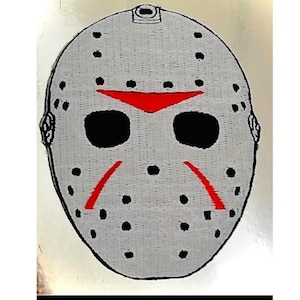 May include: A white embroidered patch of a hockey mask with red stitching. The mask has black eye holes and a black strap.