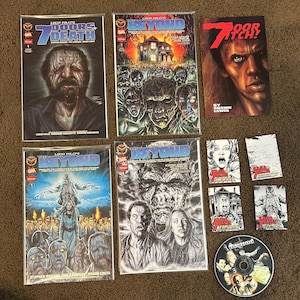 May include: A collection of horror-themed comic books and promotional materials. The comics feature illustrations of zombies and other frightening imagery. Also included are a DVD and several small cards with related artwork.