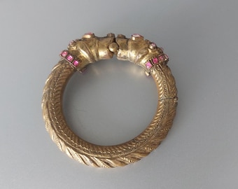 Tribal armband met dubbele drakenkop (MAKARA), scharnierende armband van roze glas.