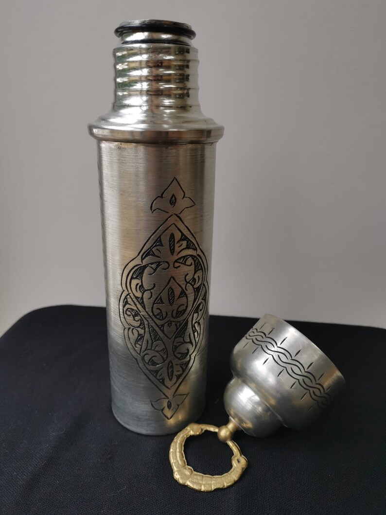 Made from high-quality pure copper, these water bottles are an eye-catching addition to any drinkware collection.