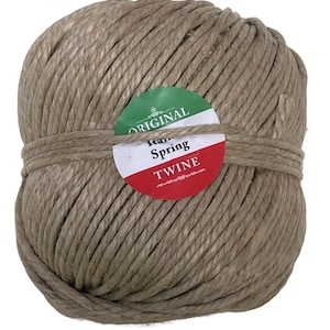 May include: A ball of natural brown twine with a red, white, and green label that reads "Original Italian Spring Twine".