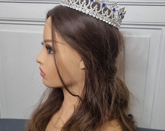 silver royal crown and blue stone tiara wedding accessory bride hairstyle