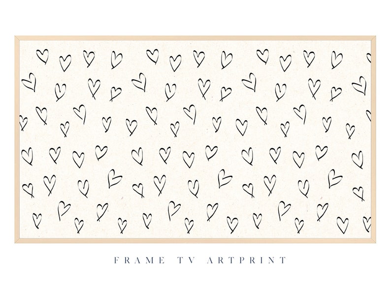 Pu&ograve; includere: Una stampa incorniciata con sfondo bianco e un motivo di cuori neri disegnati a mano.