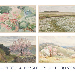 May include: Set of four framed art prints featuring watercolor paintings of landscapes. The prints depict a garden with pink and white flowers, a field of white flowers, a hillside with a pink-flowering tree, and a valley with a hillside covered in pink-flowering trees.